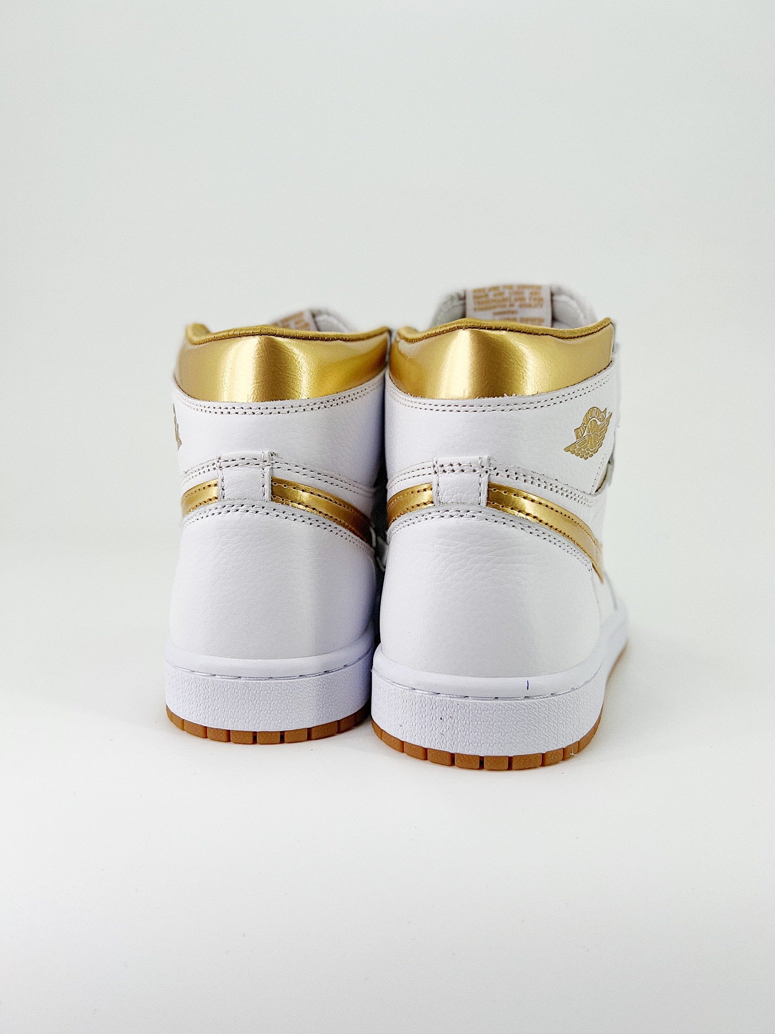 Nike Air Jordan 1 High OG “Metallic Gold”