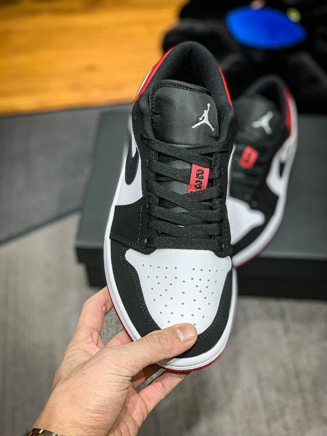 Jordan 1 Low Black Toe de Dongguan Dachang