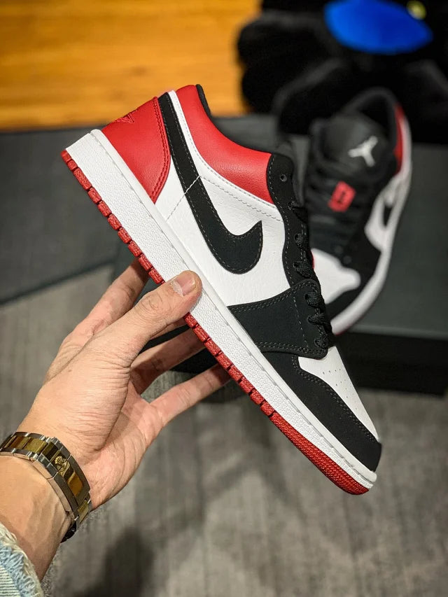 Jordan 1 Low Black Toe de Dongguan Dachang